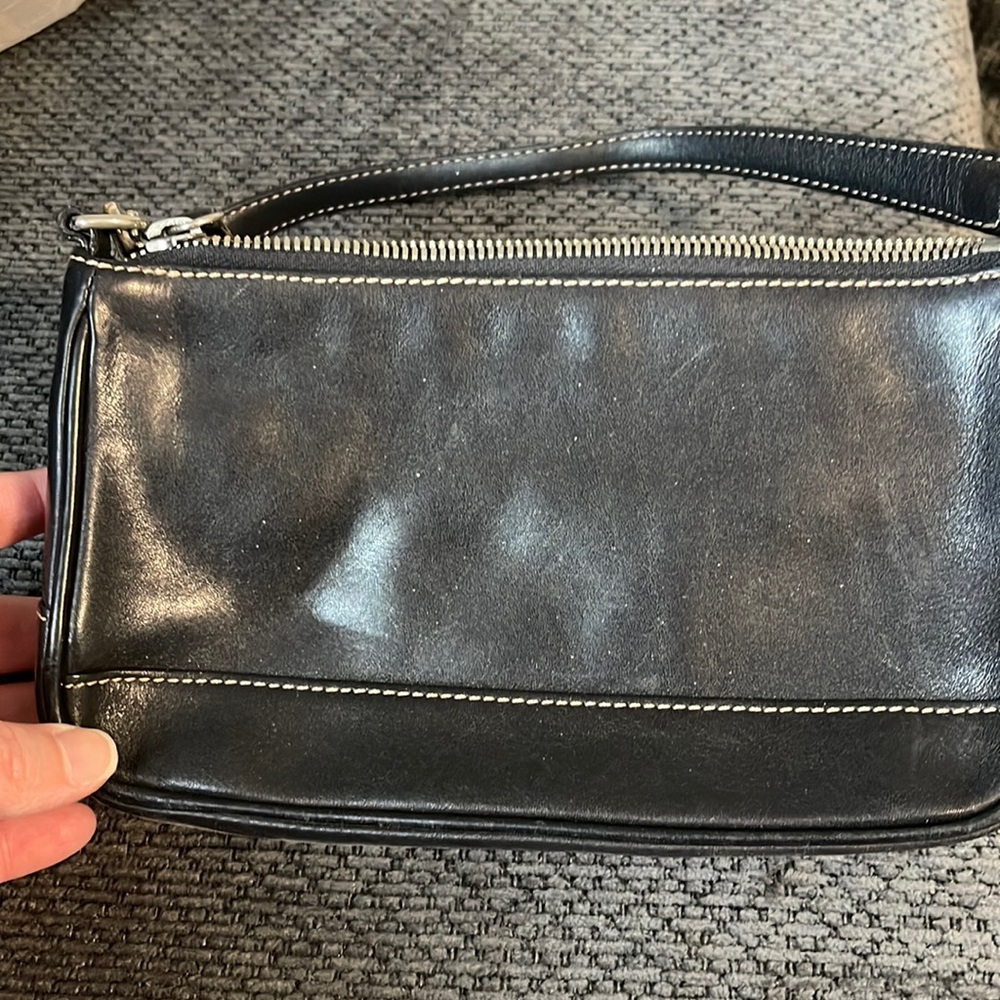 Used and loved small black Coach bag